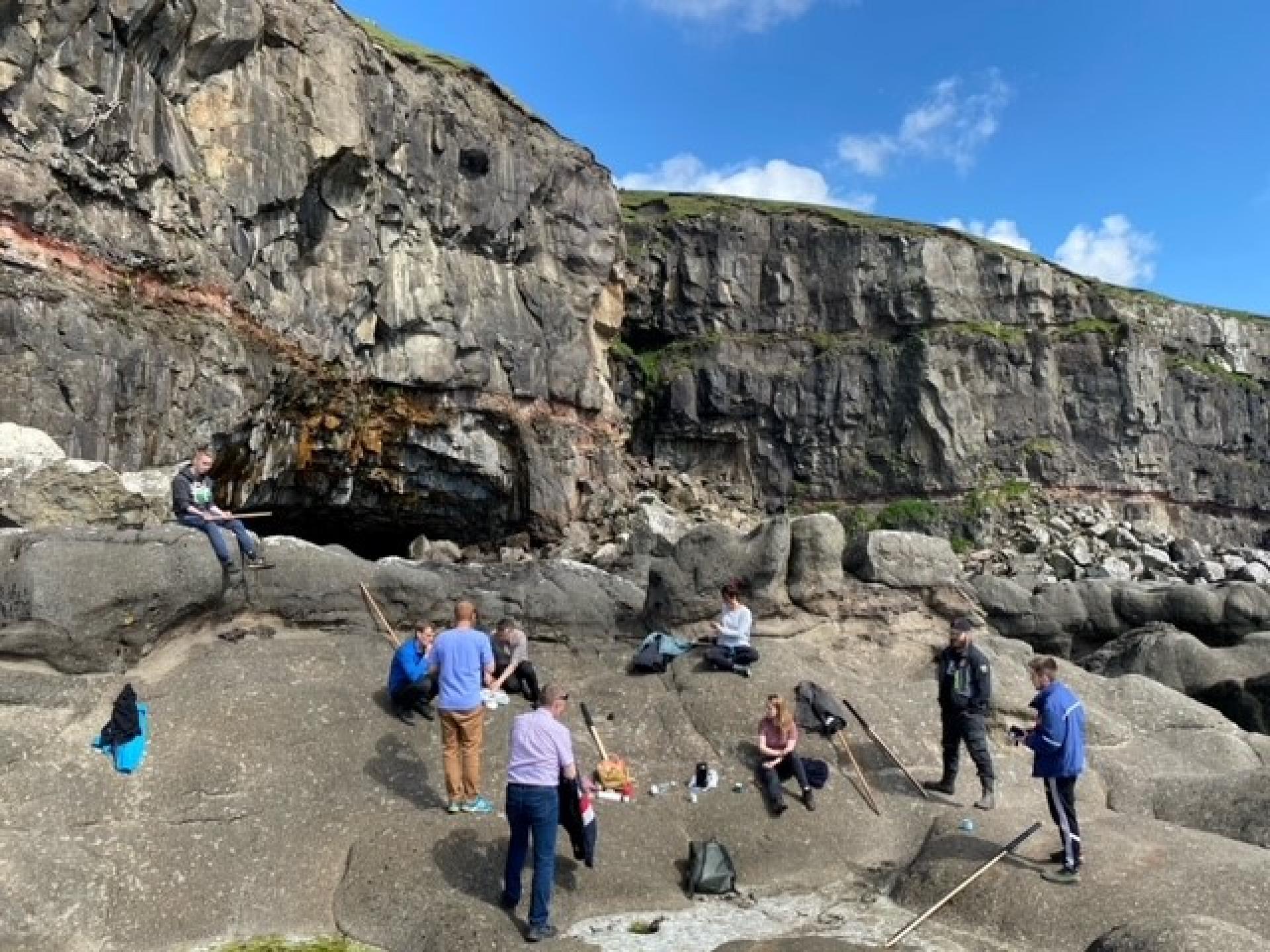 Resting and picnic outside Líðargjógv. Cave hike to Líðargjógv on Sandoy, Faroe Islands