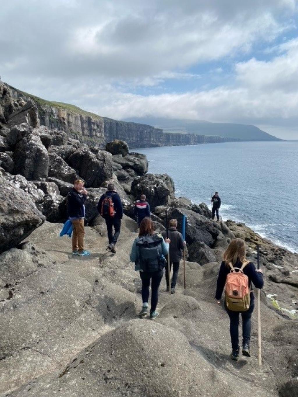 Cave hike to Líðargjógv on Sandoy, Faroe Islands